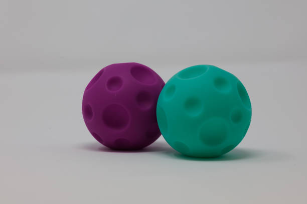 istock Purple and green space balls Toy 2149448813