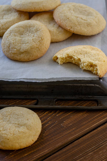 istock Delicious sugar cookies on wooden table, closeup 2149448821