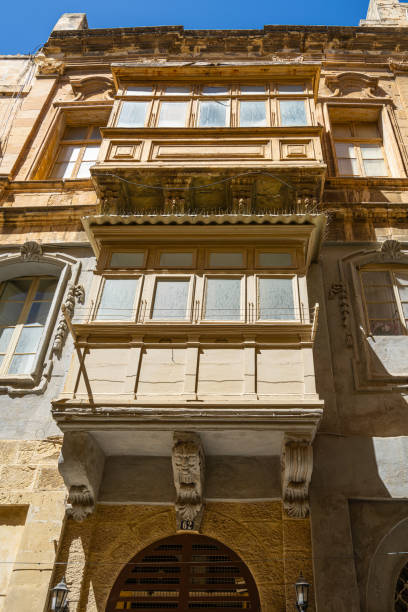 Valletta, Malta, April 03, 2024. view of the typical wooden balconies in the old buildings in the city center