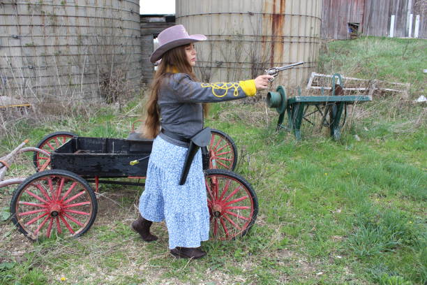 On April 14, 2024 these two women are dressed in vintage attire while standing in Tombstone Arizona for the rose festival