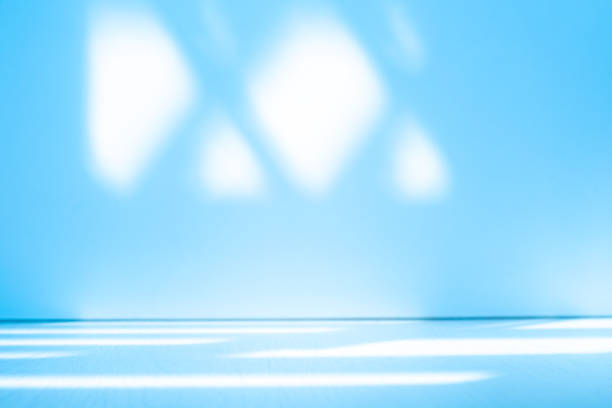 istock Wall interior background, studio, and backdrops show products. with shadow from window color white and blue light. background for text insertion and presentation of product 2149458694