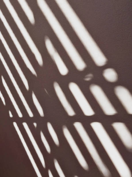istock Lines of light and shadow on the cement wall. 2149461477