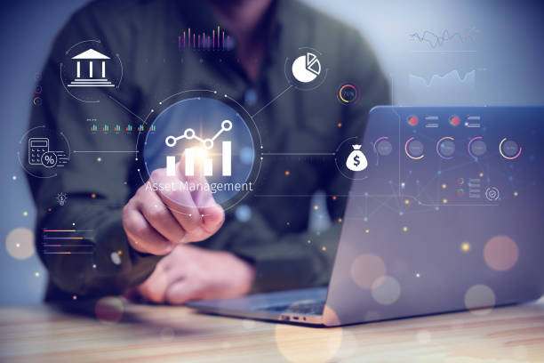 istock Asset management concept, Businessman using laptop and touch asset management Icon  on virtual display. Financial Property Digital assets. 2149461568