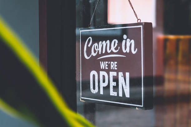istock Text on vintage black sign Come in we're open in cafe. 2149463210