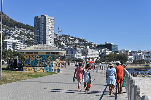 Cape Town, South Africa - March 30, 2024 - Sea Point is a suburb of Cape Town and is situated on a narrow stretch of land between Cape Town's well known Lion's Head to the southeast and the Atlantic Ocean to the northwest.