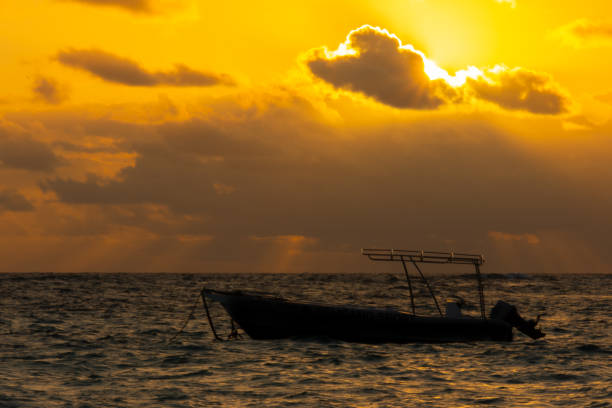 Dramatic sky over the bay of water at sunset in Krabi, Thailand