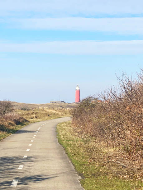 istock The road leading to the lighthouse on a sunny day 2149481966
