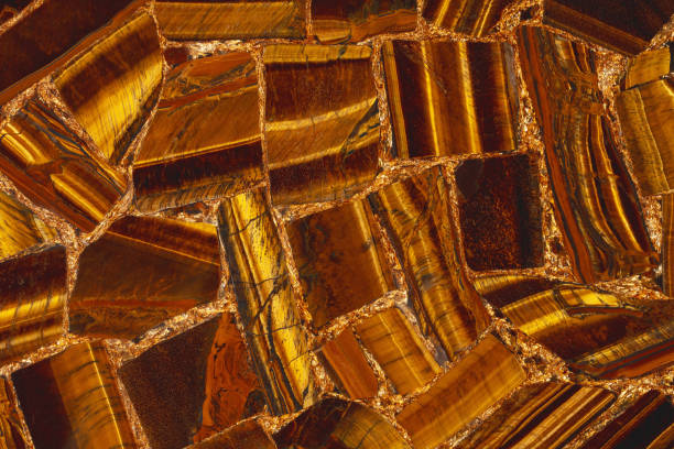 Tigers Eye Golden natural semi precious brown stone texture for unique design interior and other art work.