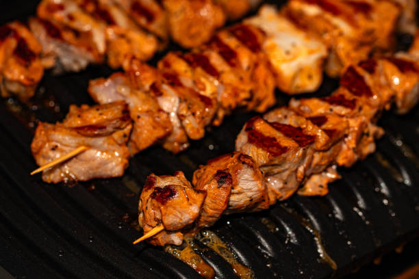 Closeup of meat prepared on electric grill for design purpose