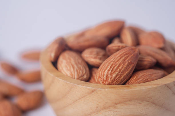 istock Almond snack fruit in wooden bowl 2149487706