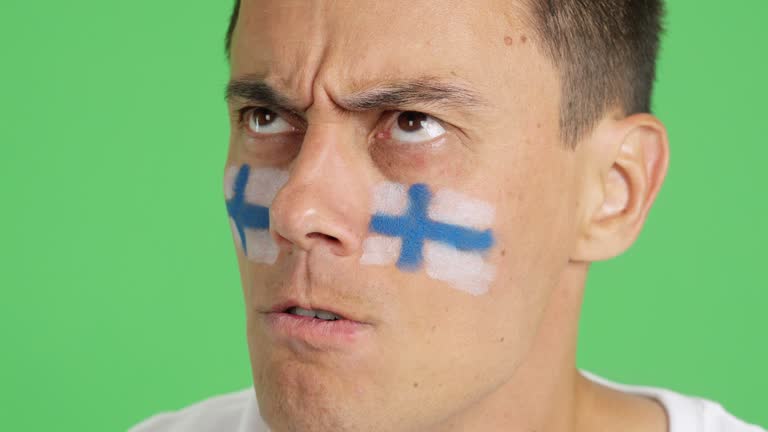 Man with finnish national flag upset with a referee