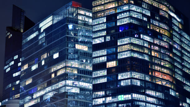 istock Office buildings by night. Night architectural, buildings with glass facade. 2149491266