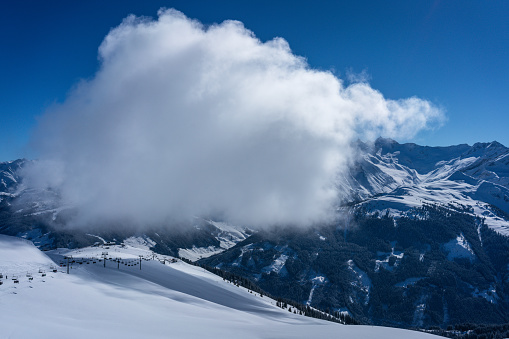 Cloud over the ski slope in Hochzillertal, Tyrol, Austria