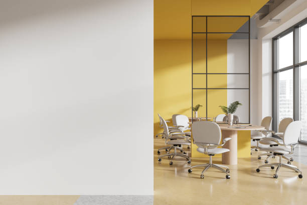 istock Colored coworking interior with work tables and seats, window. Mock up wall 2149494280