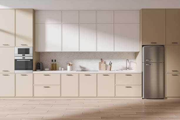 istock Modern home kitchen interior with cooking cabinet and kitchenware, wooden floor 2149494759