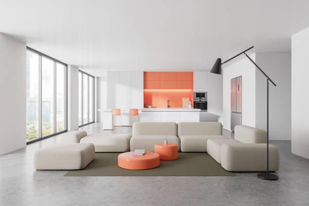 istock White modern home interior with cooking and relaxing space with couch and window 2149494787