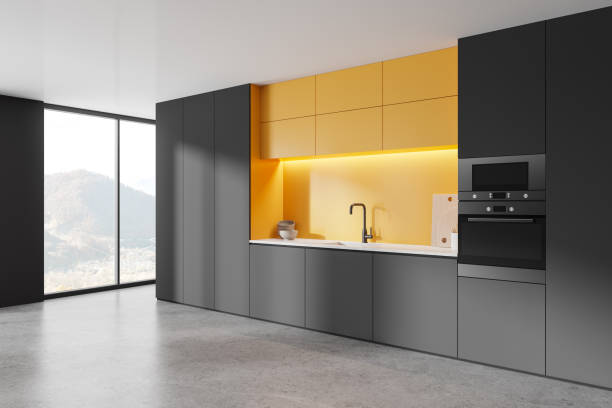 istock Dark home kitchen interior with cooking cabinet, sink and oven with kitchenware 2149495400