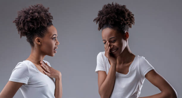 istock Woman's gossip meets her own reflective amusement 2149496140