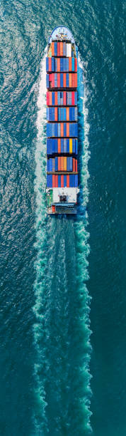 istock Express Cargo Container Ship with contrail in the ocean ship carrying container and running for export concept technology freight shipping by ship forwarder mast 2149497390
