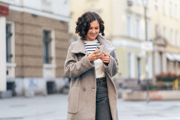 istock Texting in the city 2149499375