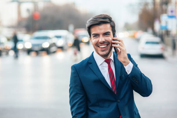 istock Cheerful businessman talking on the phone 2149499383