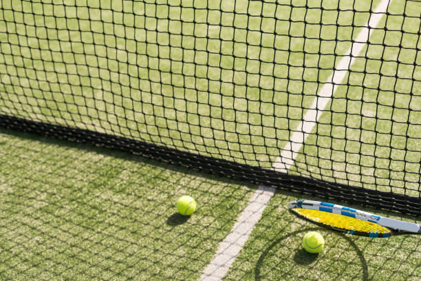 istock Tennis net on a green field 2149499828