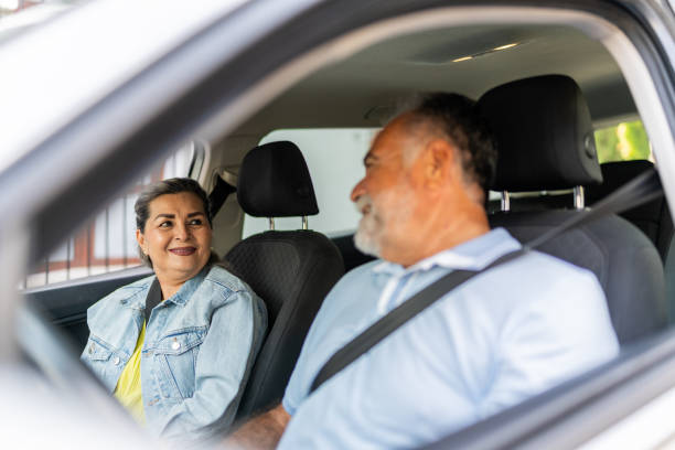 istock Senior couple talking inside a car 2149500605