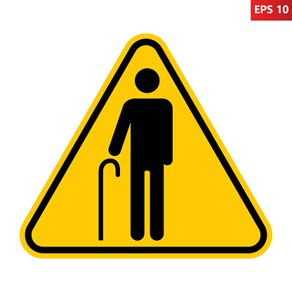Elderly people warning sign. Vector illustration of yellow triangle sign with standing elderly man with cane icon inside. Priority access for old person.