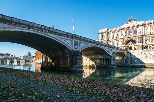 A view on the river Tiber bridge Ponte Umberto I and the General Prosecutor's Office