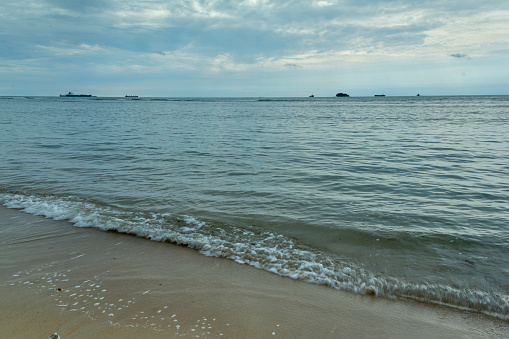 Landscape with beach sea view, sand, and dead coral, laguna beach, kaur, indonesia
