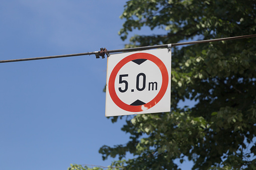 Warning sign in Imber village, Wiltshire.  The area is in the middle of the Salisbury Plain military training area and public access is restricted.