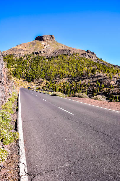 istock A road with a mountain in the background 2149507909