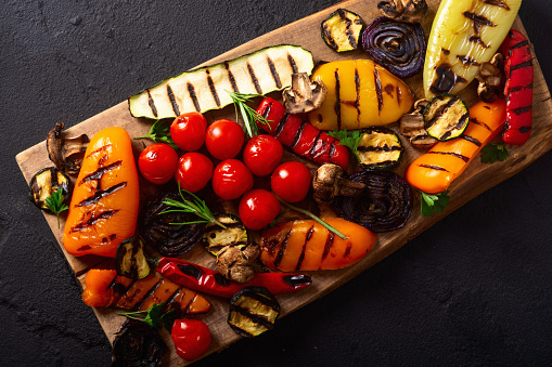 Colorful grilled vegetables on a pan barbecue . Top view