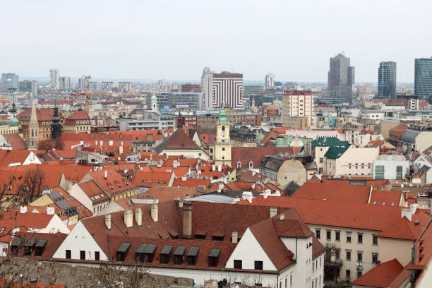 View of Bratislava from the Old Town. Red roofed houses from above. Spring in Europe.