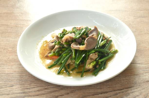 istock stir fried garlic chives with chicken organ 2149514578