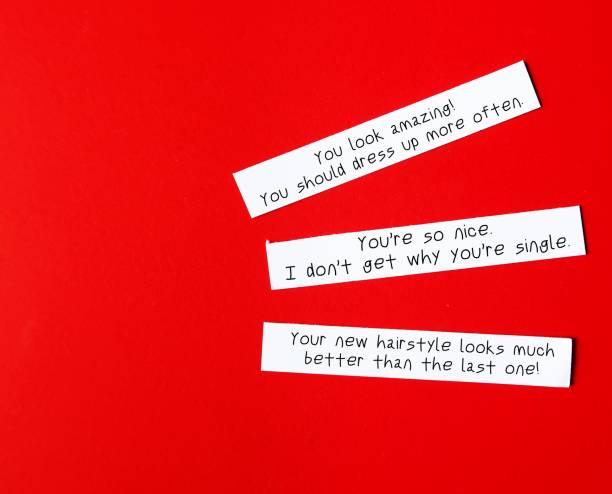 istock Note paper with sample of Backhanded Compliments - remark which seems to be an insult than compliment, seems positive but has a negative undertone 2149515496