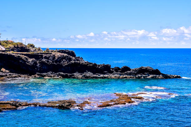 istock A beautiful blue ocean with a rocky shoreline 2149517247