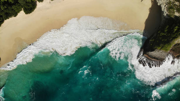 istock Top view of empty sea beach with wave foam 2149519246