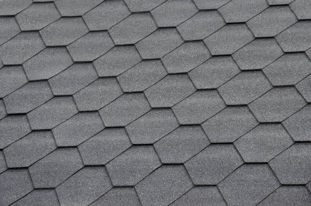istock Hexagonal gray shingle roof tile background 2149521040