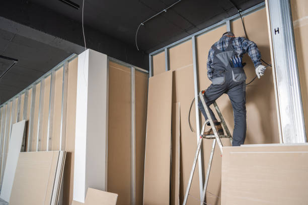 istock Caucasian Electrician Contractor Installing Electric Cable 2149525012