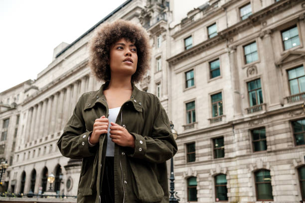 istock Young female model posing in front of old building. 2149525785