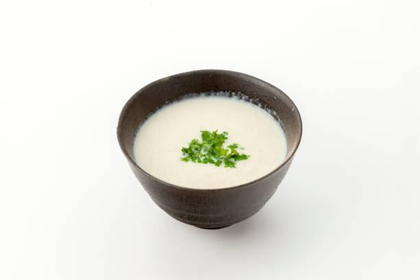 istock Enoki Mushroom potage soup with parsley 2149525891