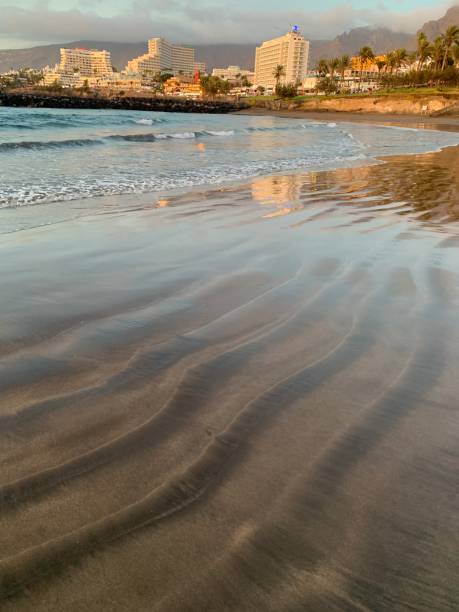 istock Playa de las americas Tenerife at sunset 2149526089