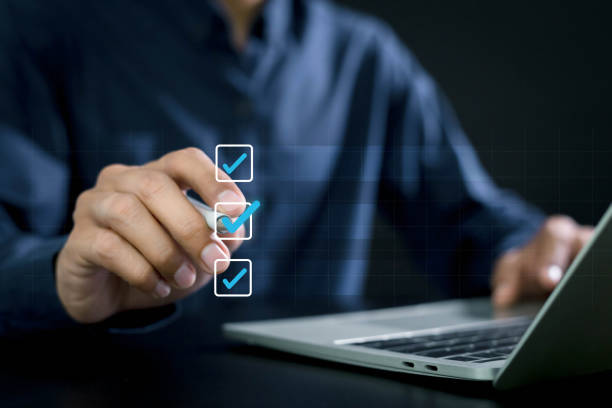 istock Businessman checking mark on check box to approved documents . management approval and and project approve concept. 2149528195