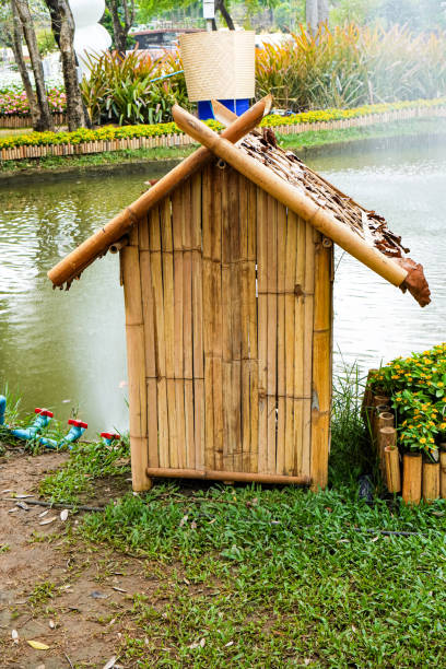 old wooden bathhouse and summer  pond