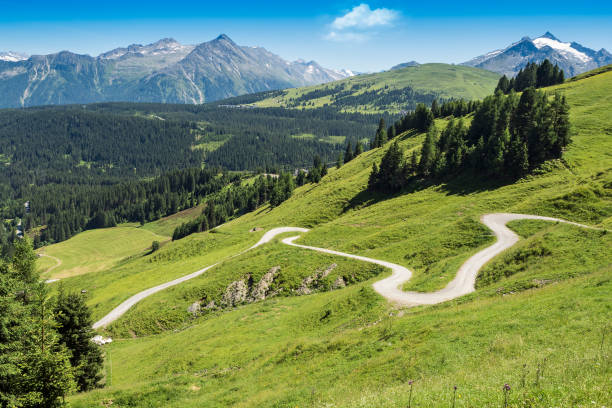 Winding hiking path in Alps, Austria