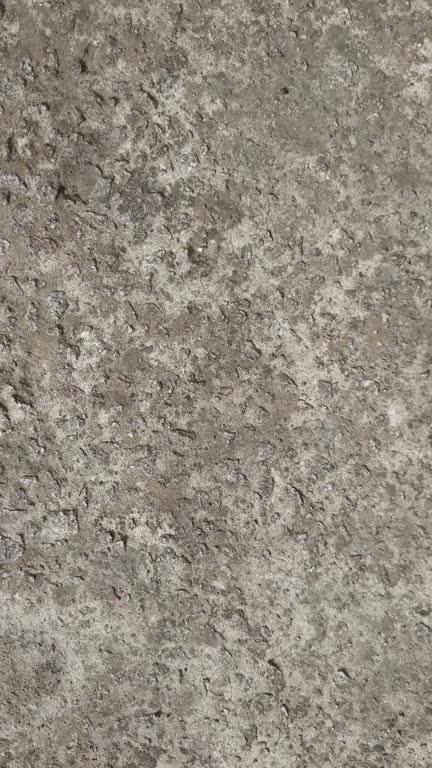 Concrete road texture animated video background. Seamless loop