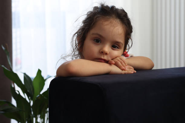 istock Bored Little Girl At Home 2149533241