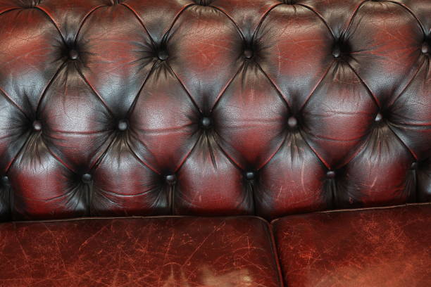 istock Fragment of an old leather sofa 2149534528
