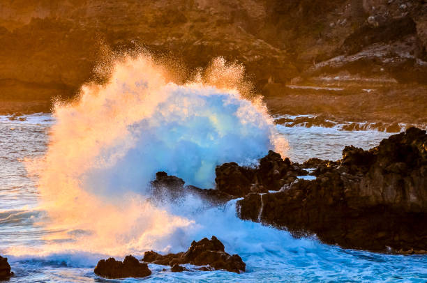 istock The ocean is crashing against the rocks, creating a powerful and dramatic scene 2149537478